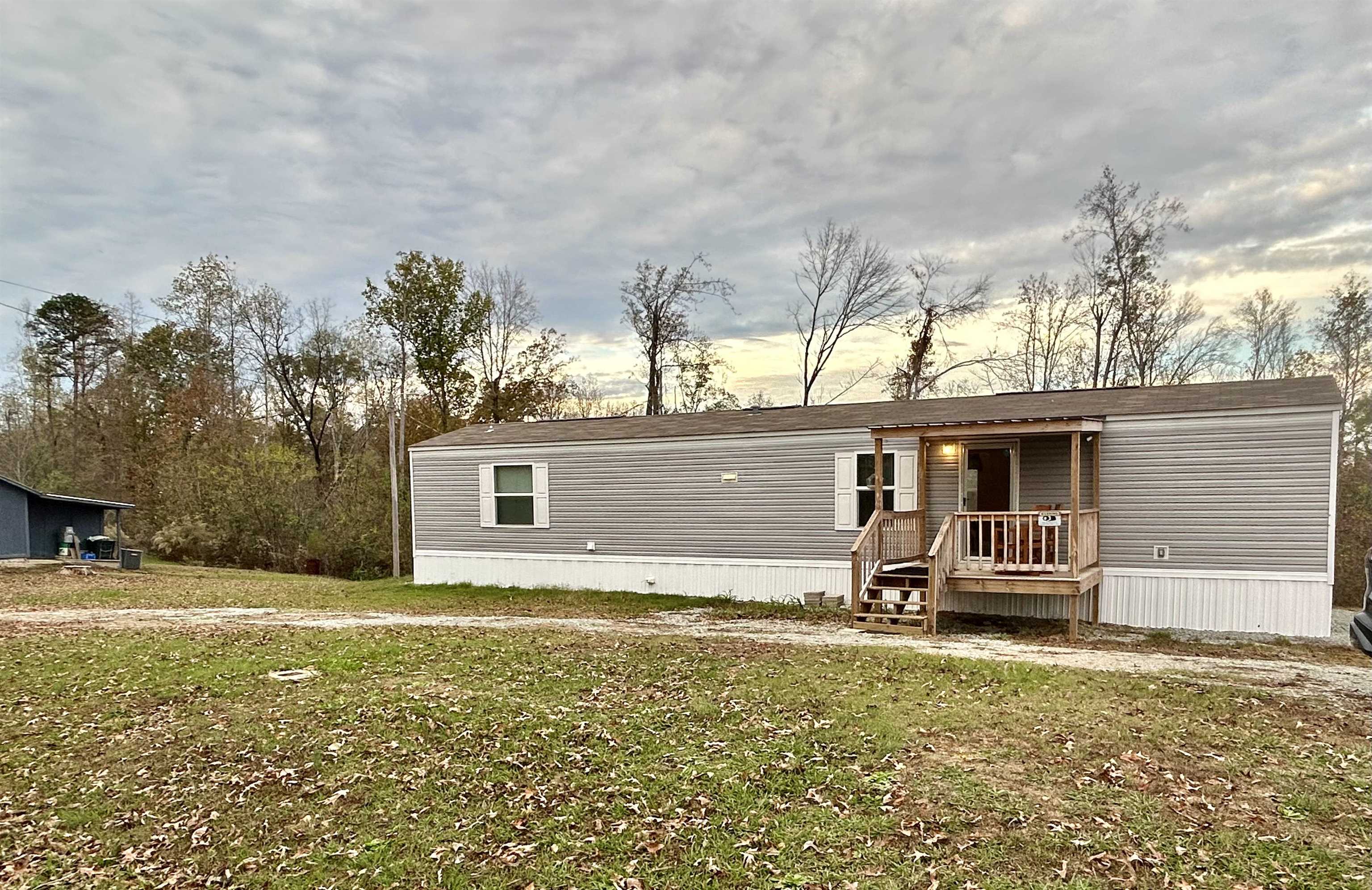 View of front of house with a lawn