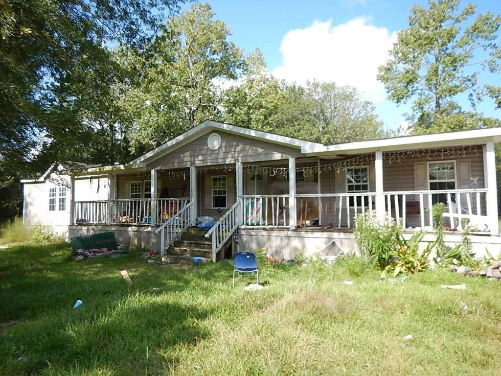 a house view with a garden space