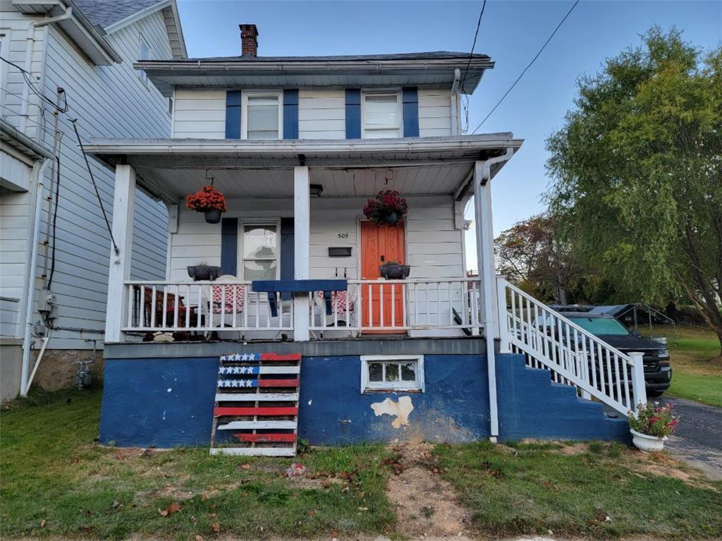 a front view of a house with balcony