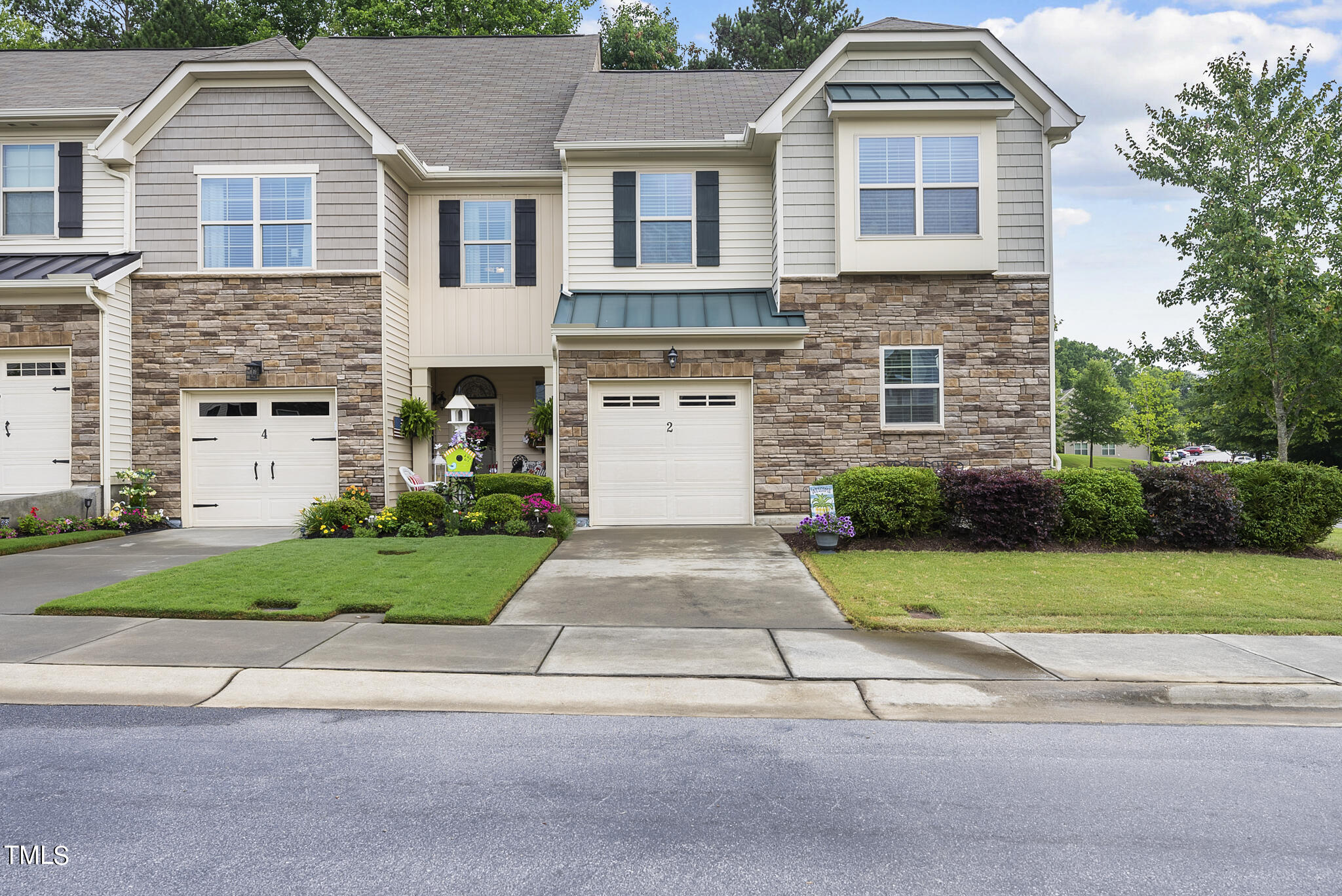 front view of a house and a yard