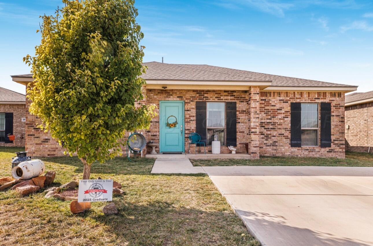 front view of house with a yard