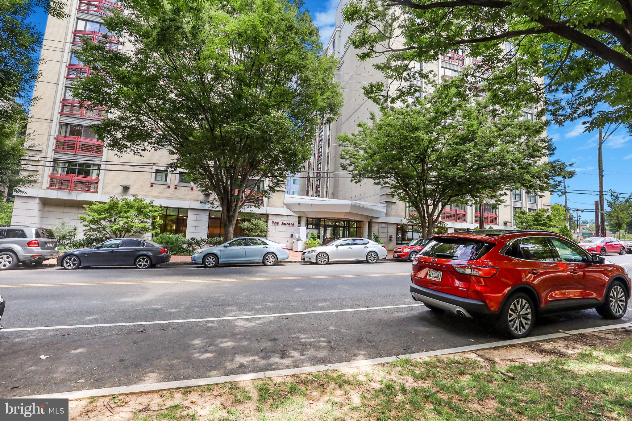 a view of a cars parked in front of a house