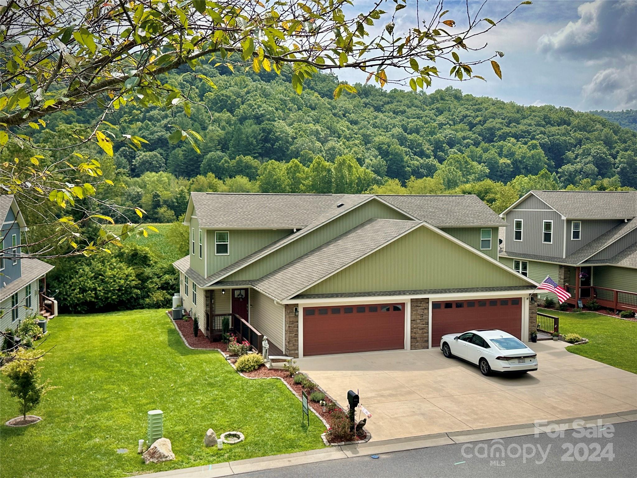 an aerial view of a house with garden