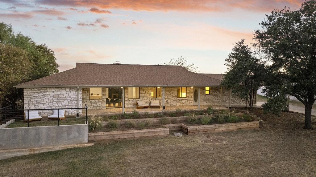 front view of a house with a yard