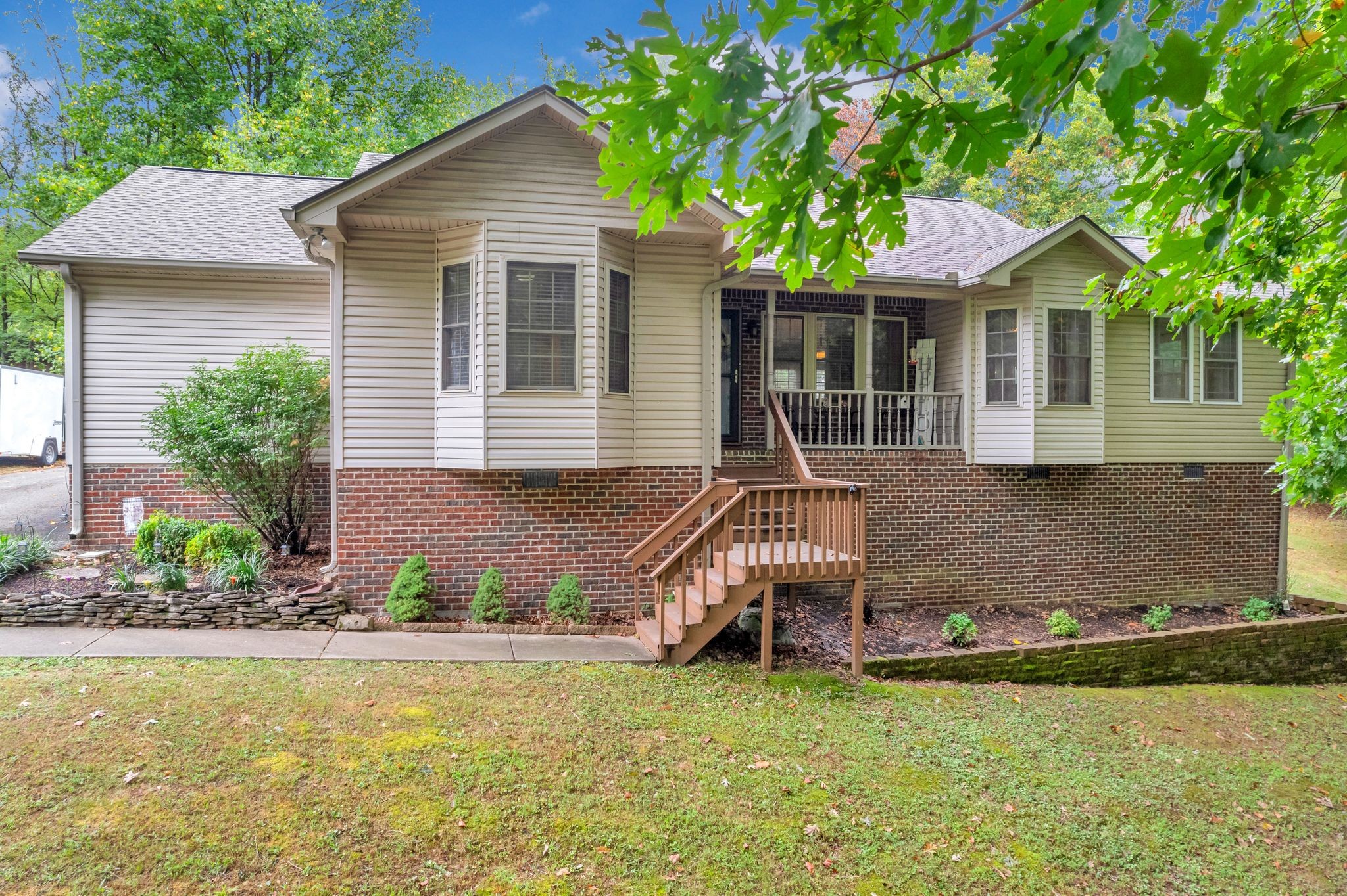 a front view of a house with garden