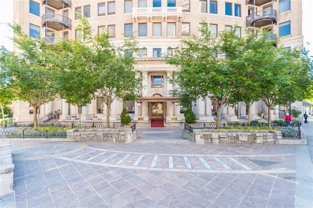 a front view of a building with street view