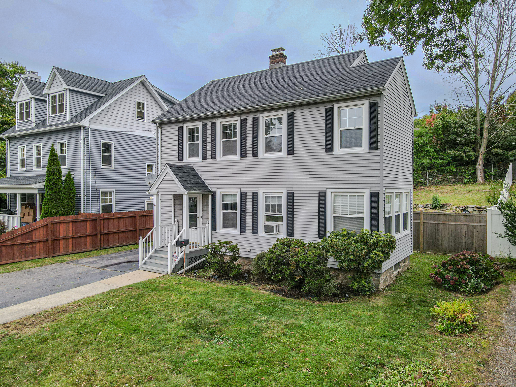 a house view with a garden space