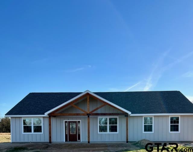 a front view of a house with yard