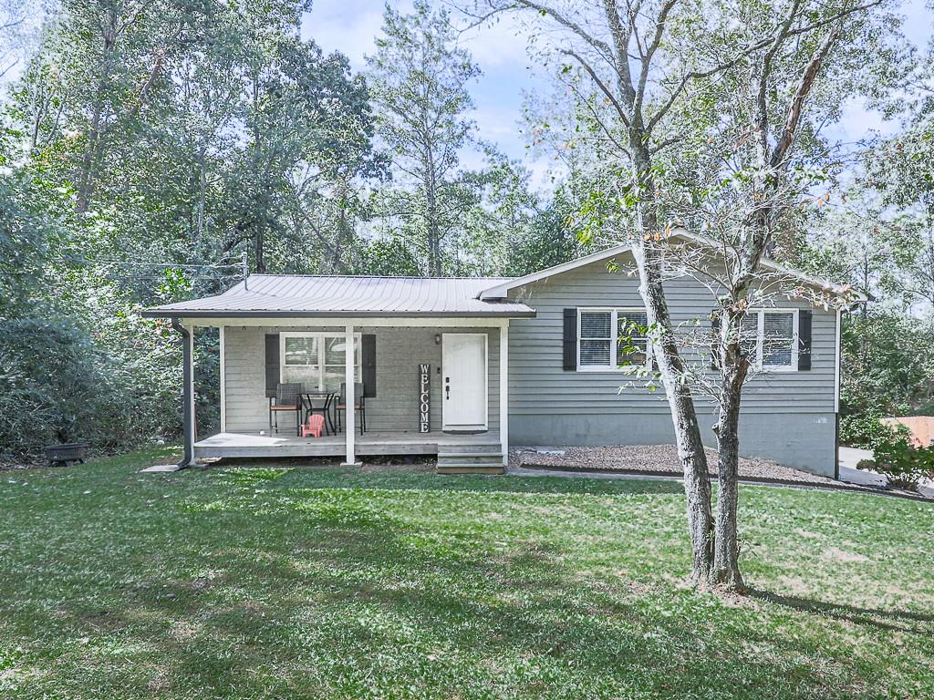 front view of a house with a yard