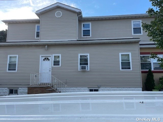 a view of a house with a balcony