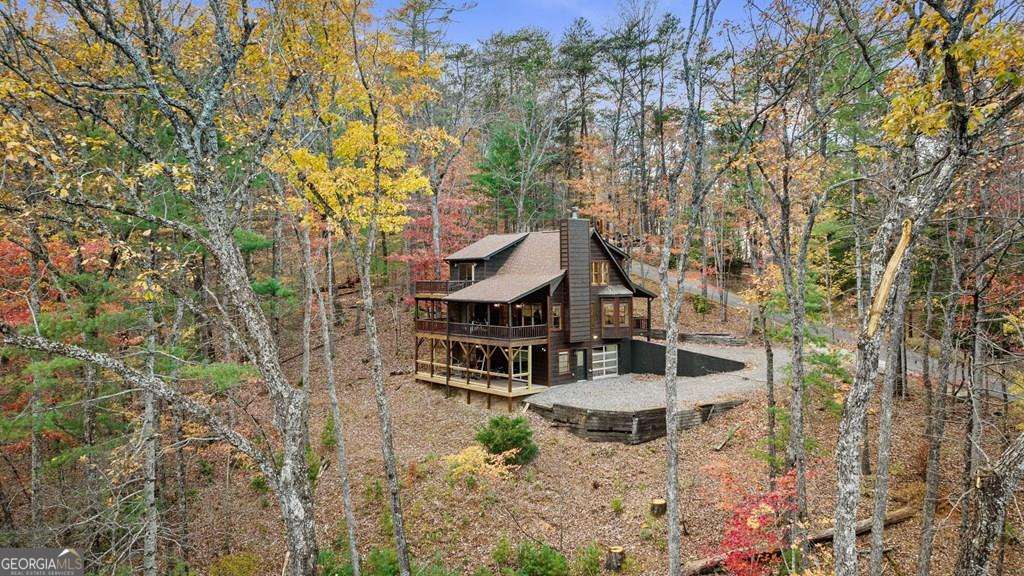 a house with trees in front of it