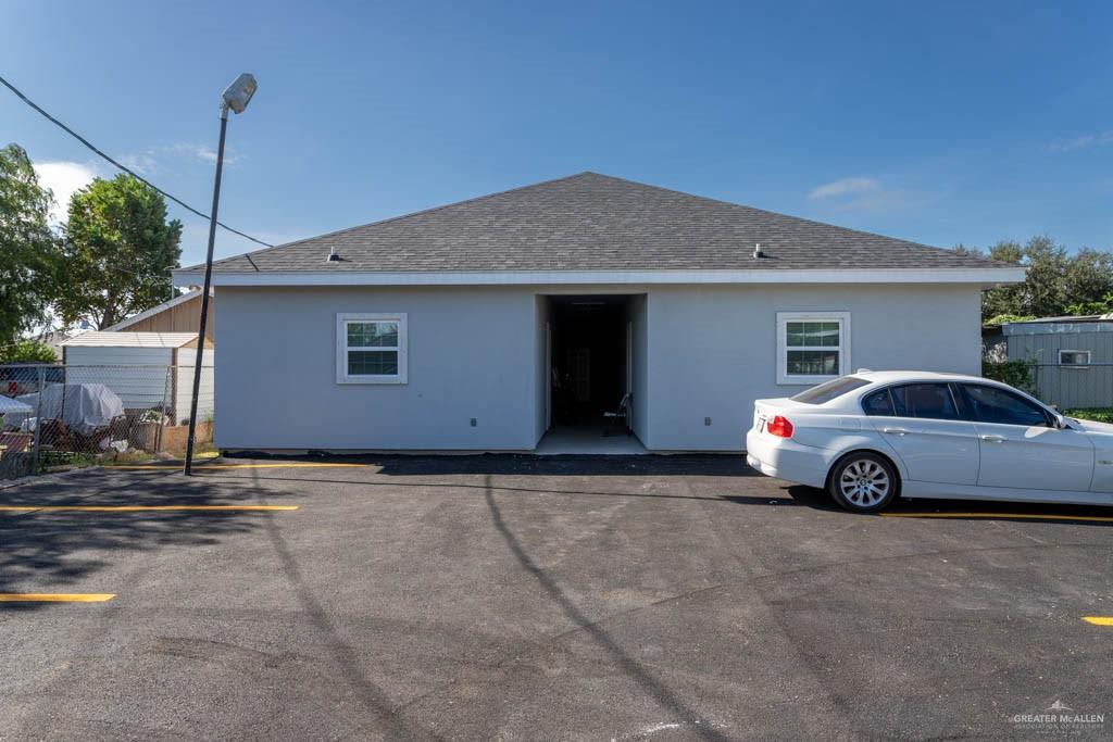 a car parked in front of a house