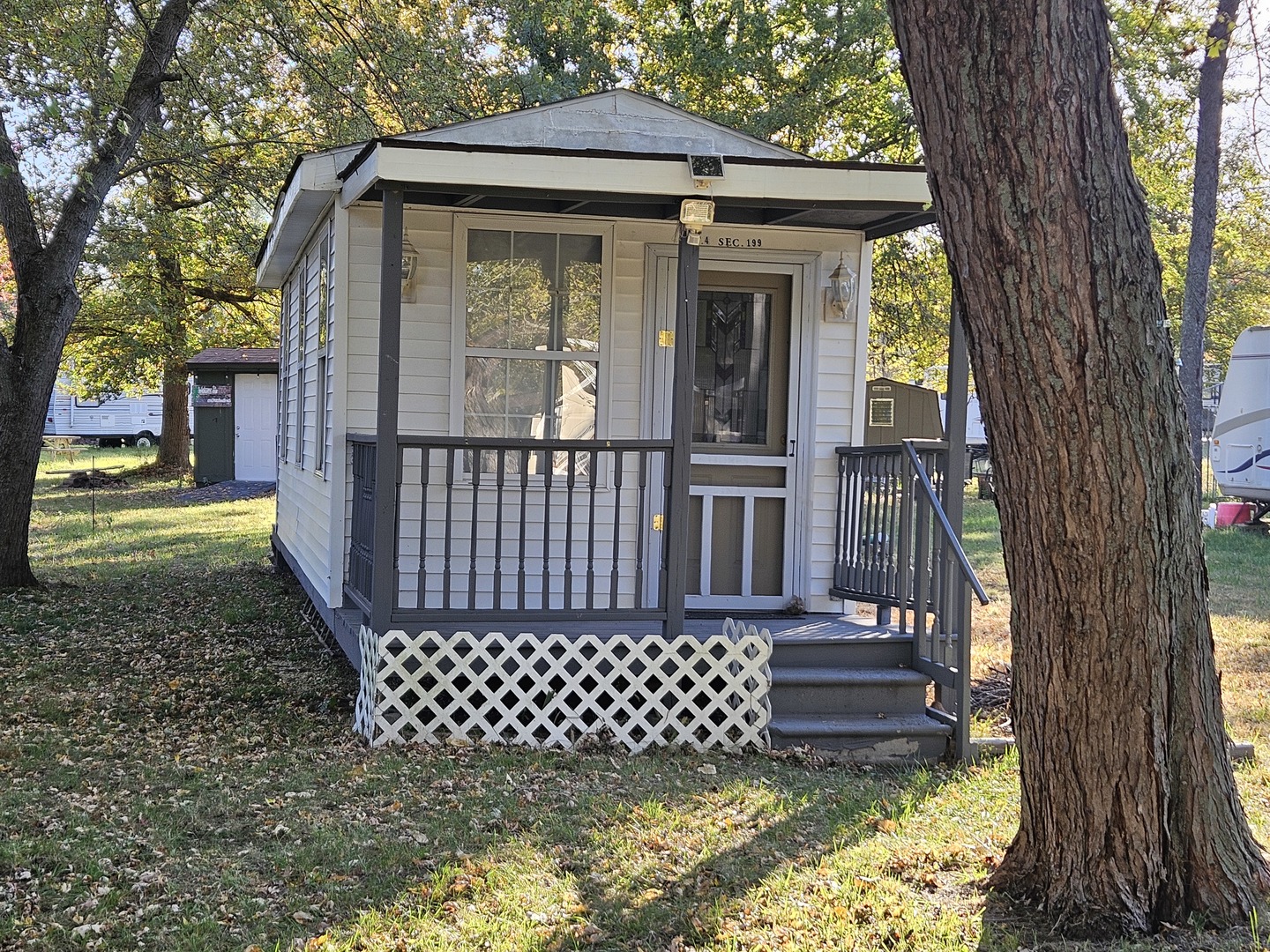 a view of a deck with a large tree