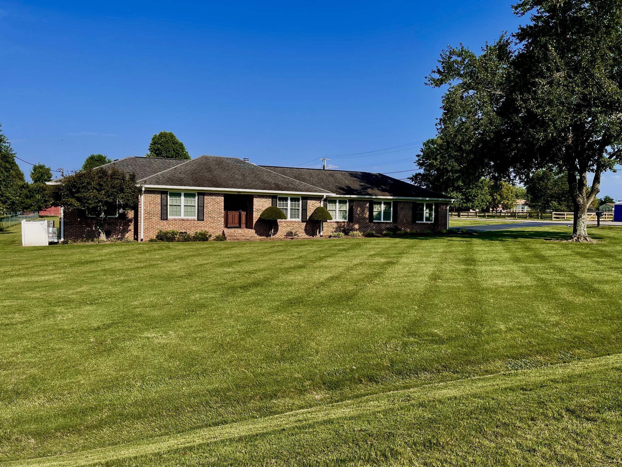 a view of a house with a big yard