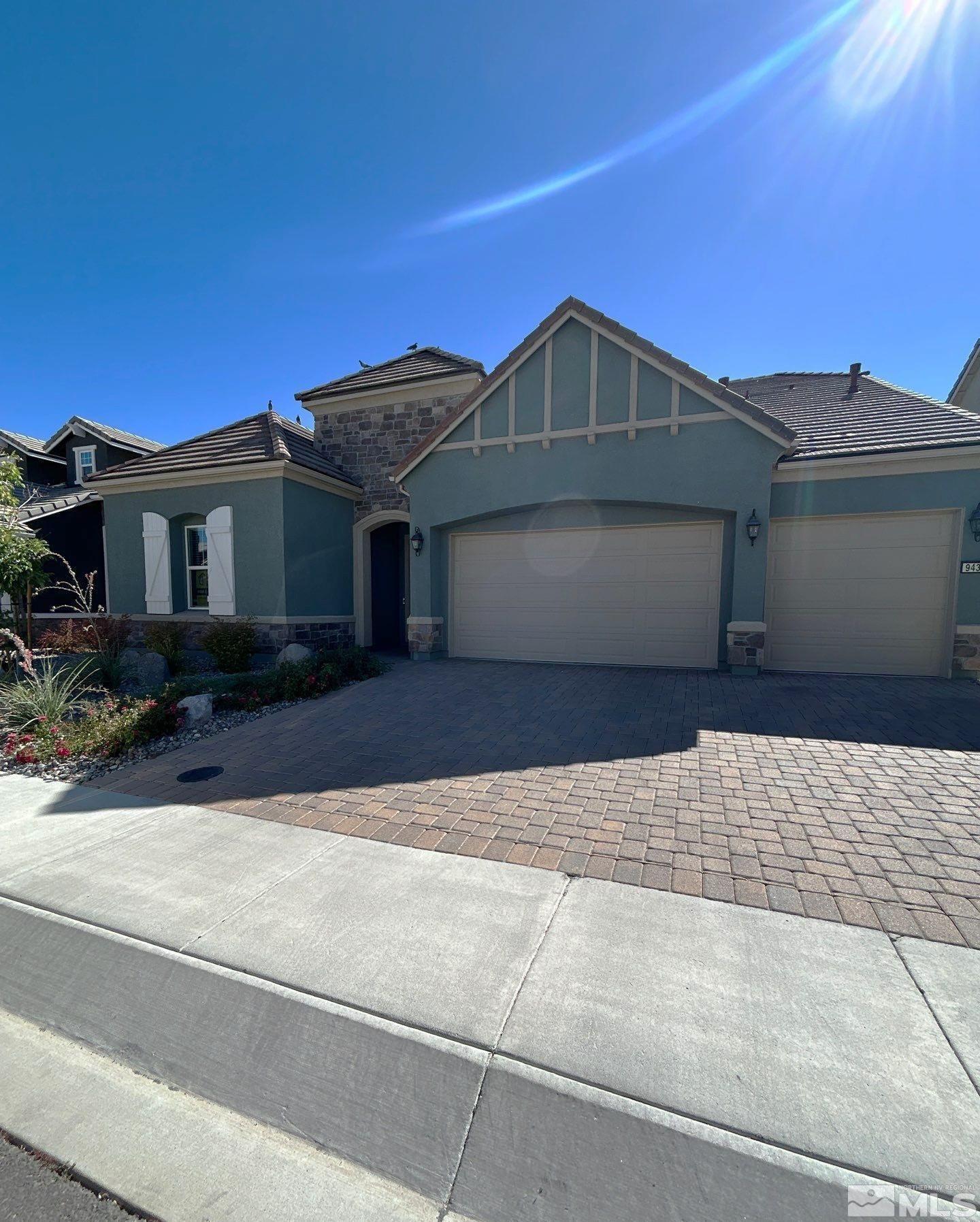 a front view of a house with yard