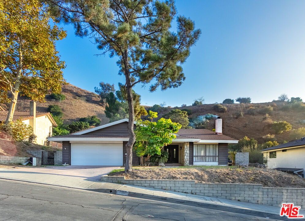 front view of a house with a street