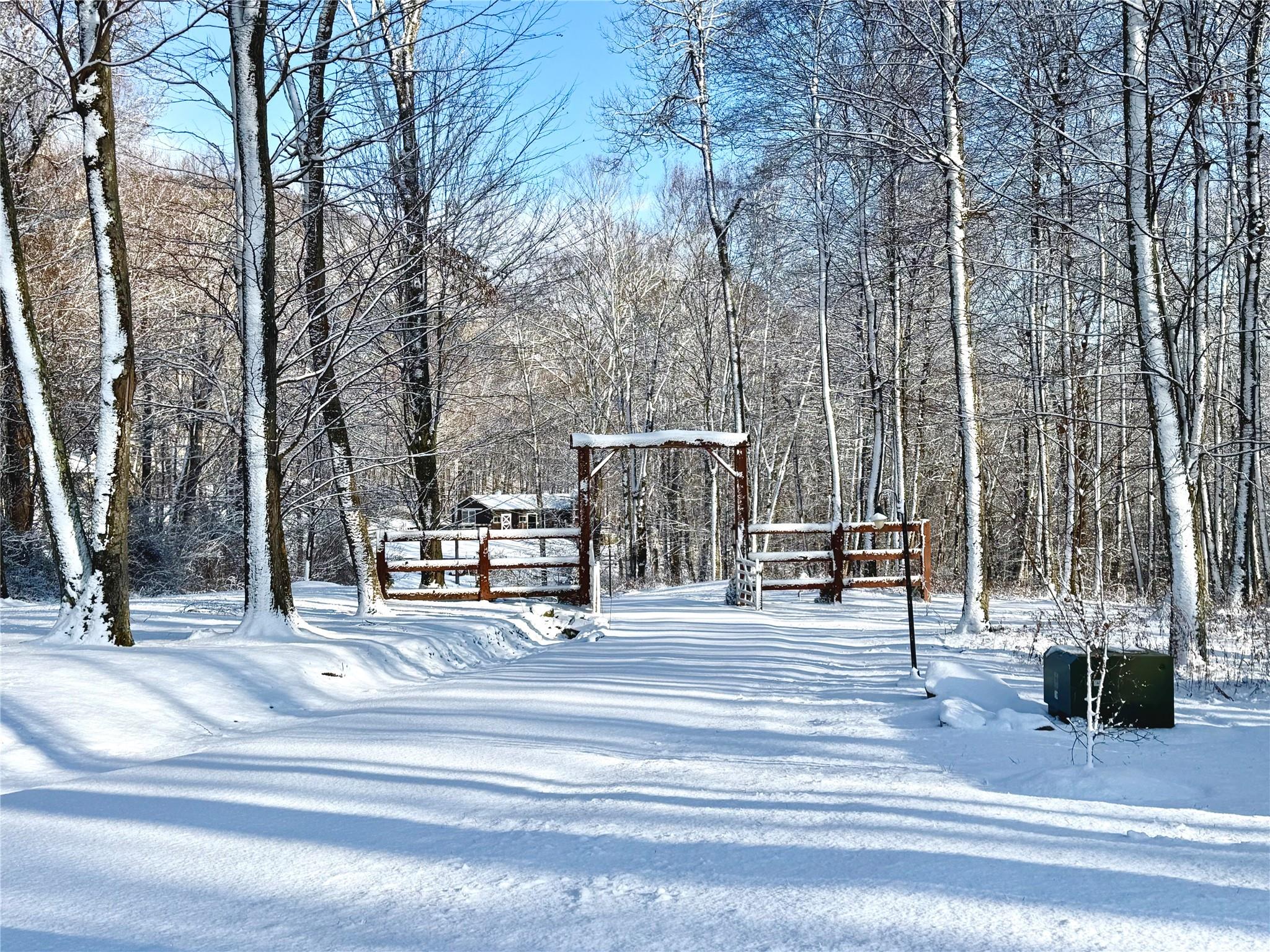 Ranch style gate inviting to you to own 12.5 acres of quiet luxury. Call for an appointment or information.