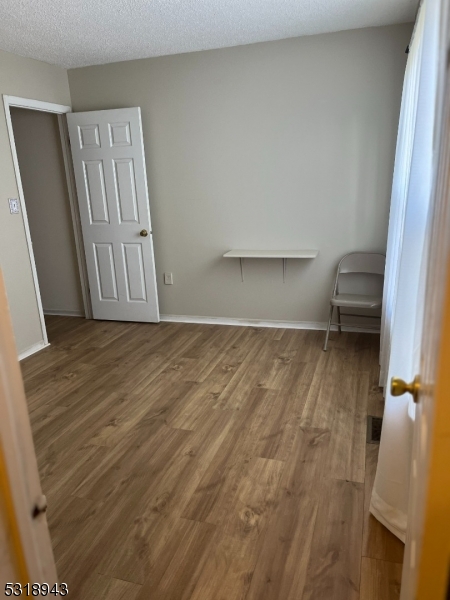 a view of room with window and stairs