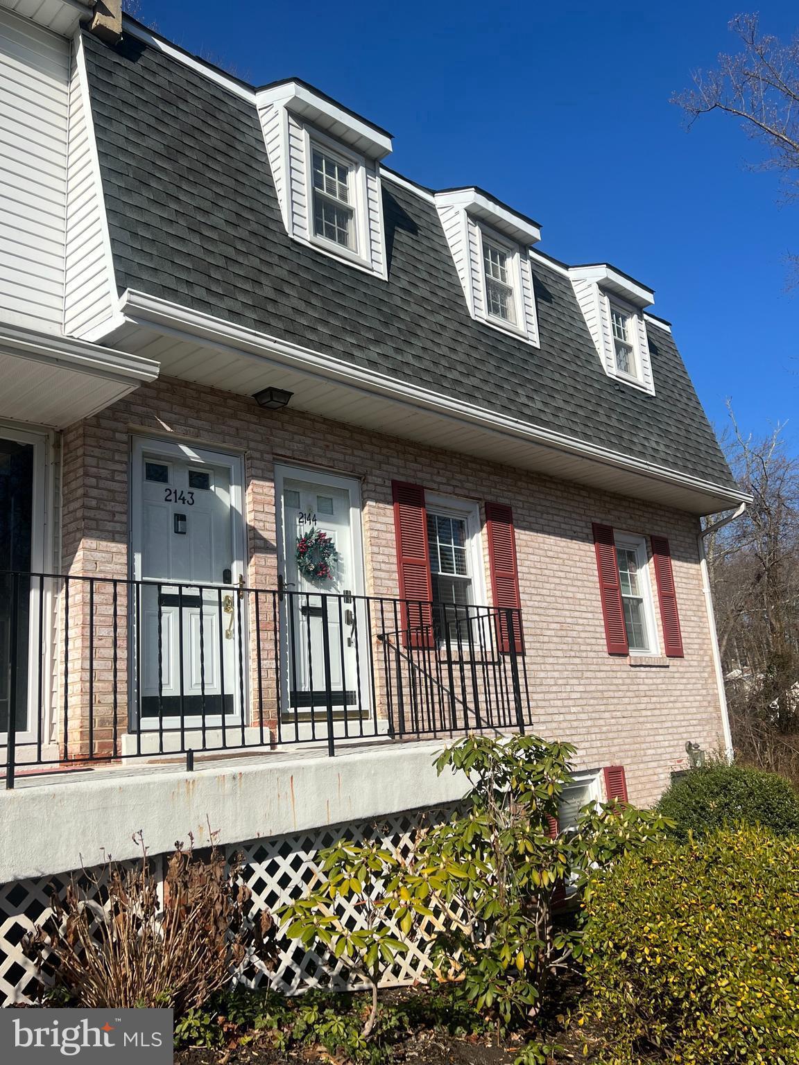 a front view of a house with balcony