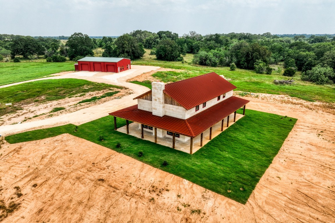 a front view of a house with yard