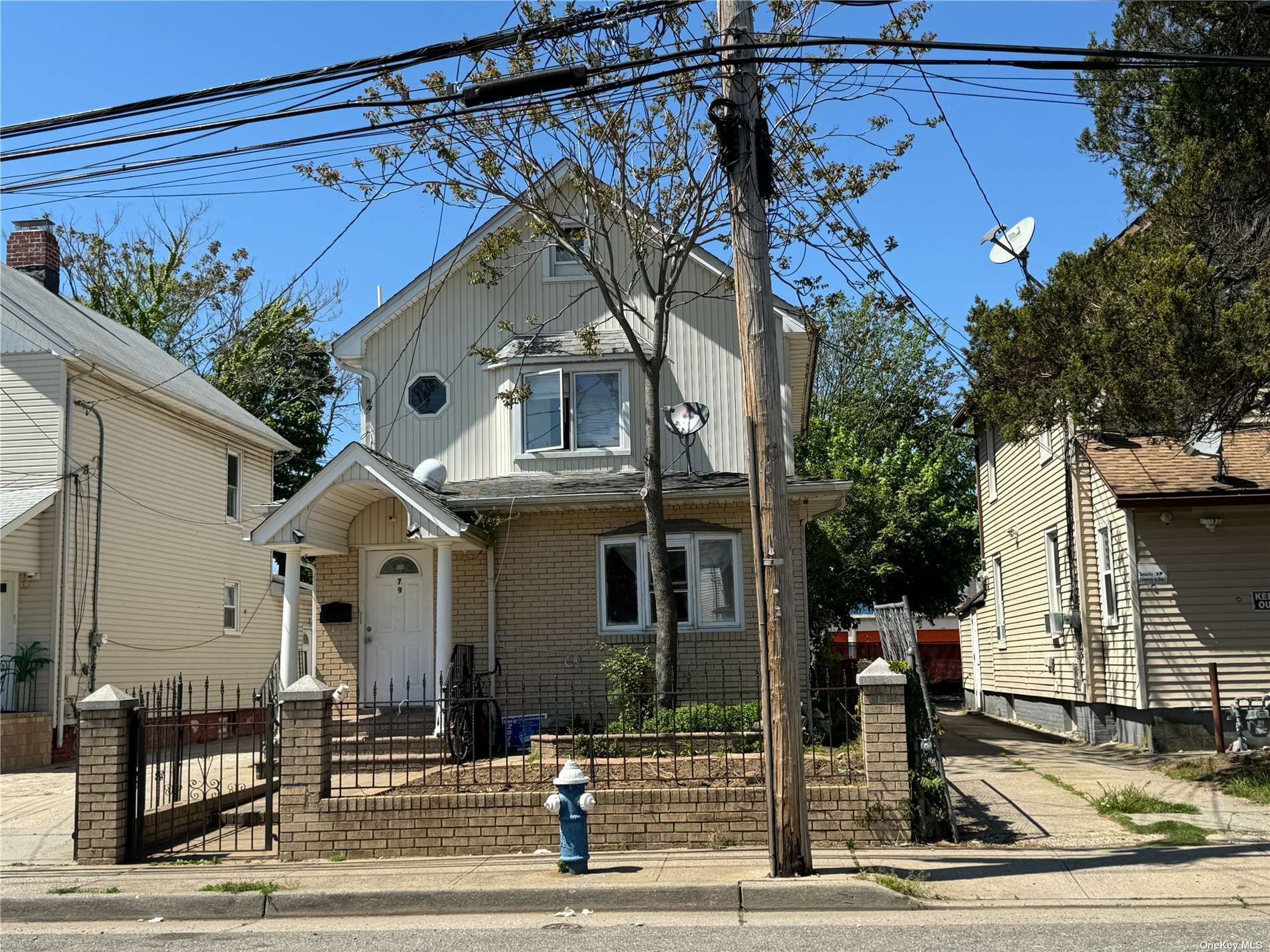 a front view of a house with garage