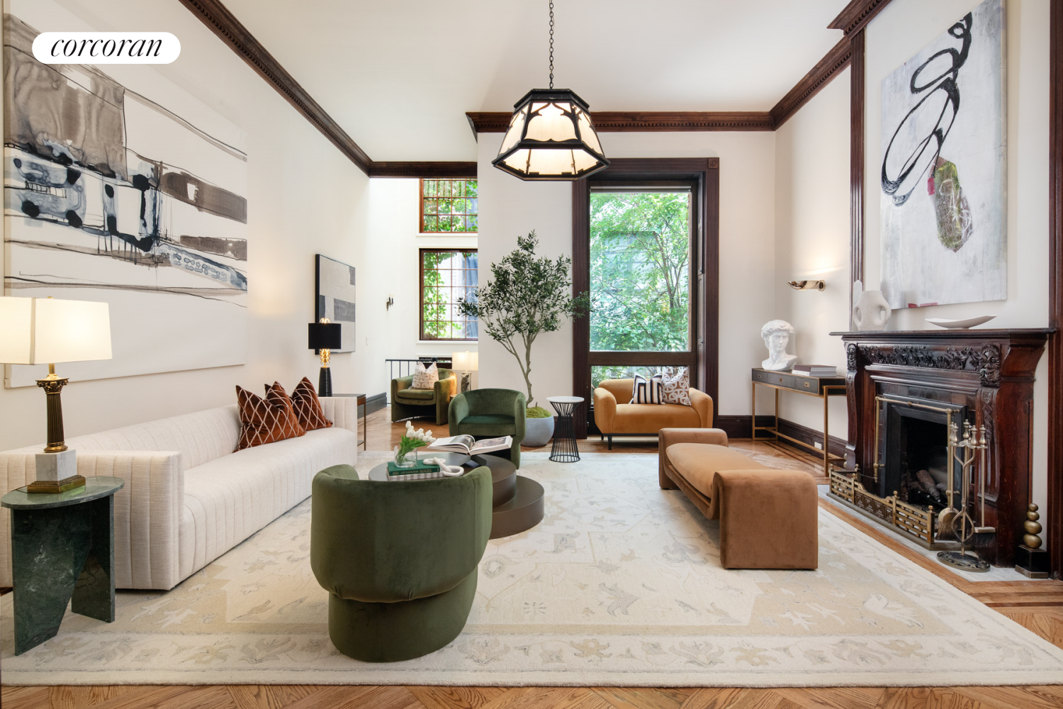 a living room with furniture large window and fireplace