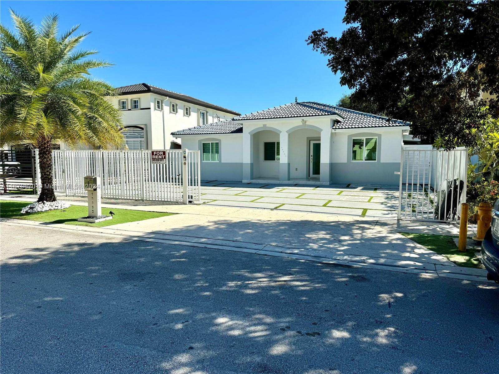 a view of a house with swimming pool