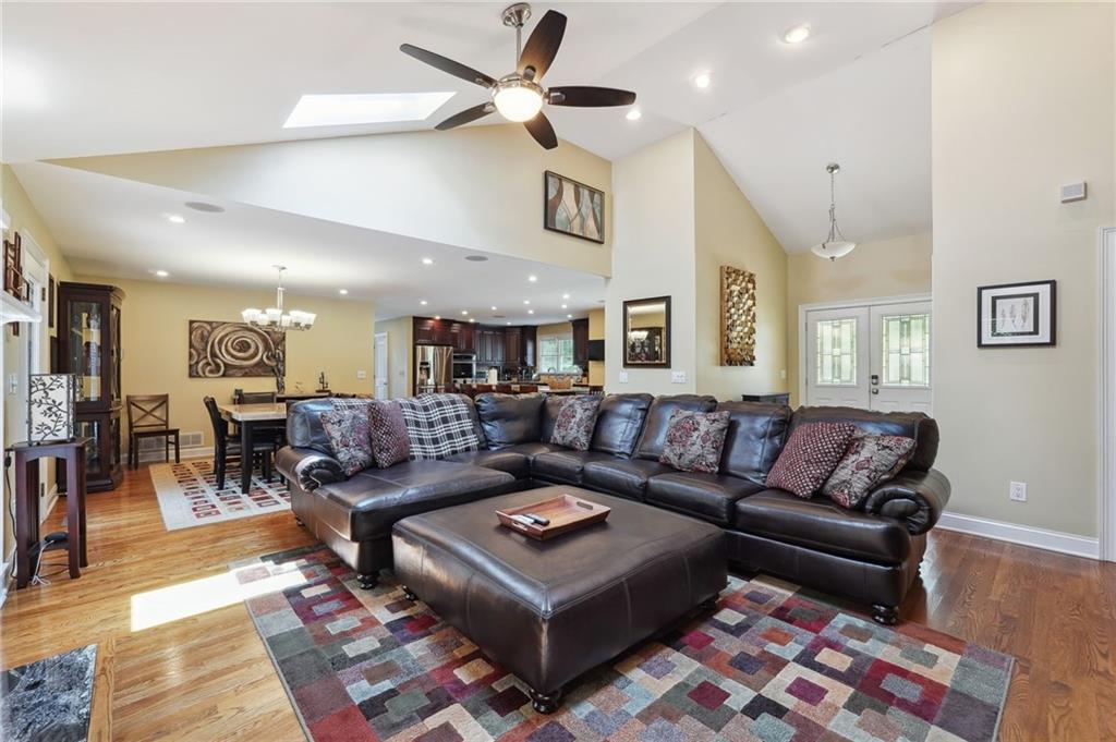 a living room with furniture and a rug