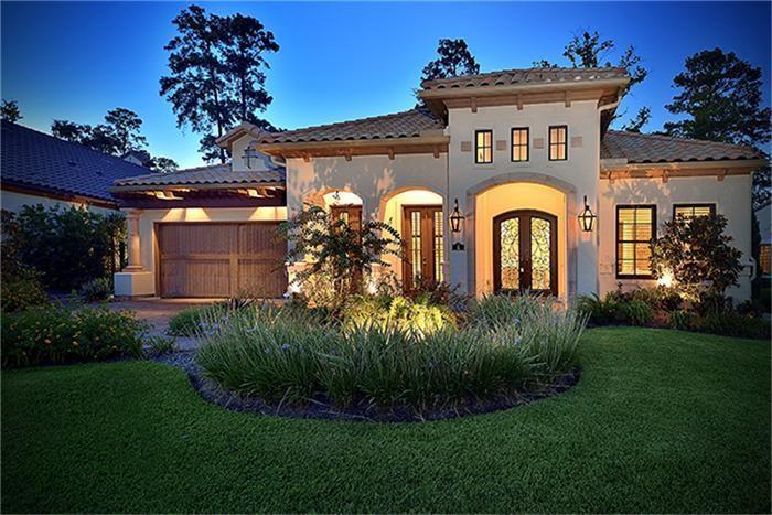 a view of a house with a garden