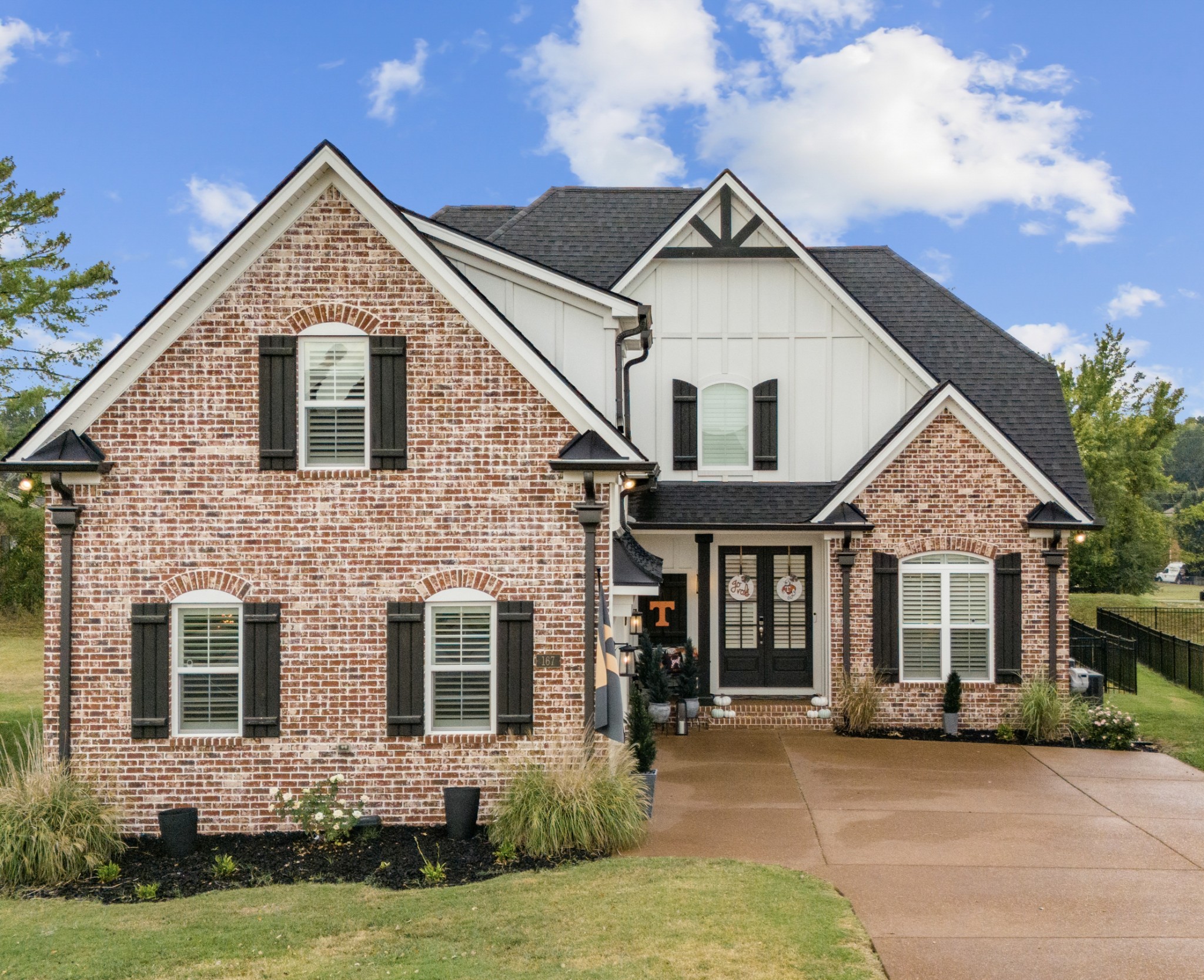 front view of a house with a yard