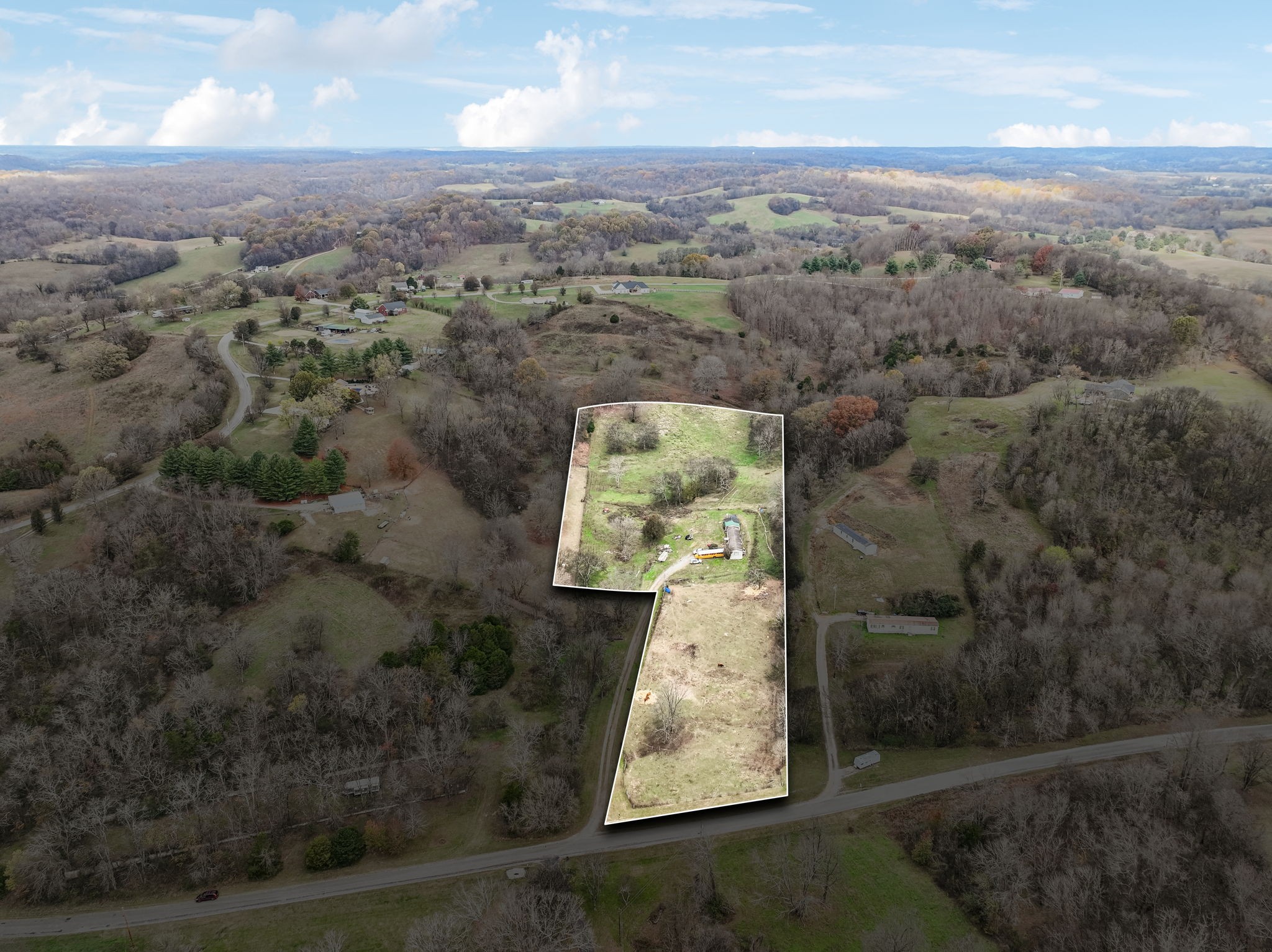 an aerial view of houses with yard