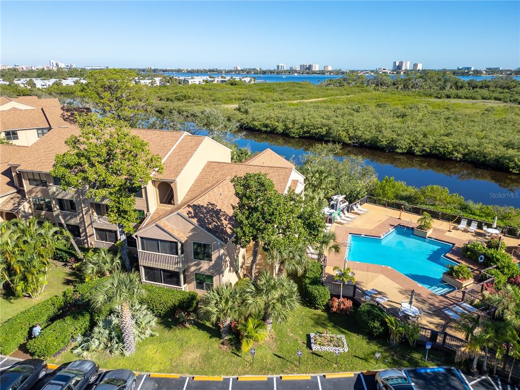 an aerial view of a house with a lake view