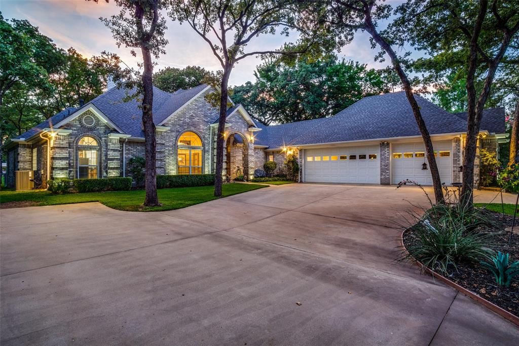 a house with palm trees in front of it