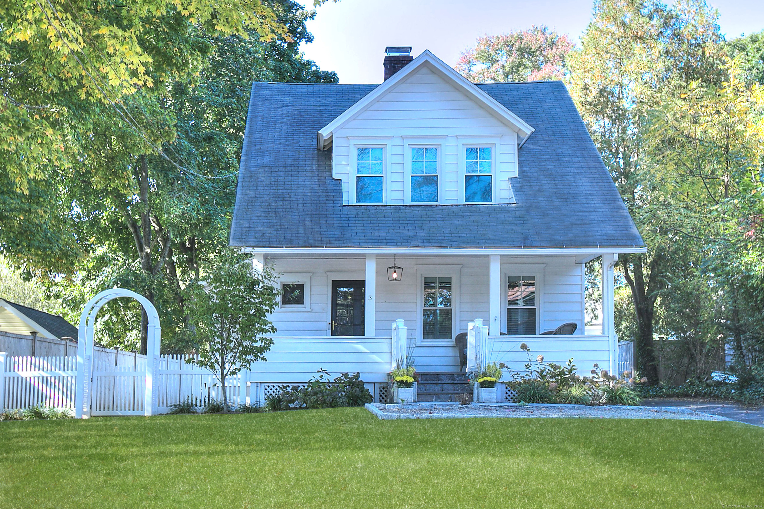 front view of a house with a yard