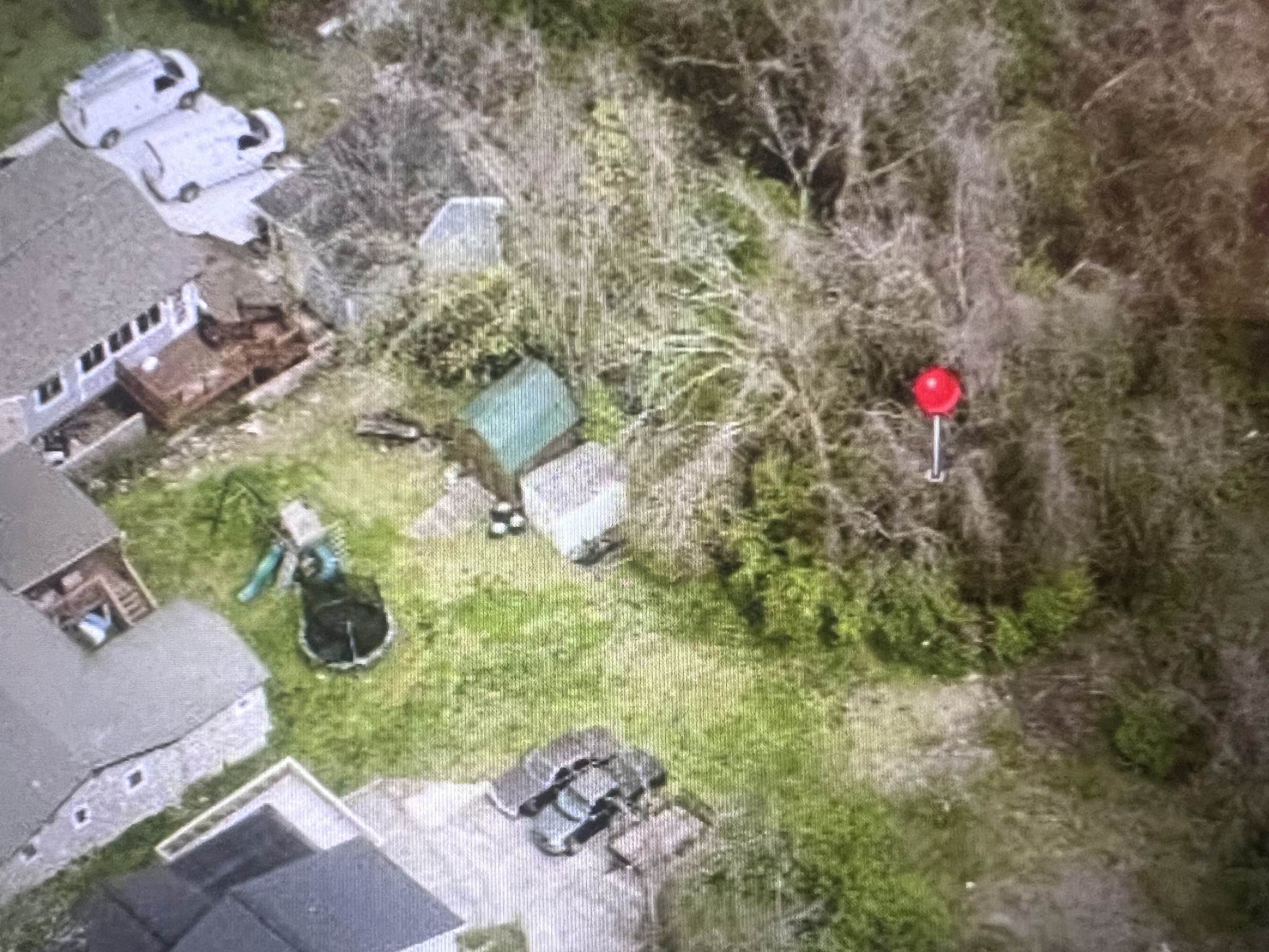 a aerial view of a house with a yard