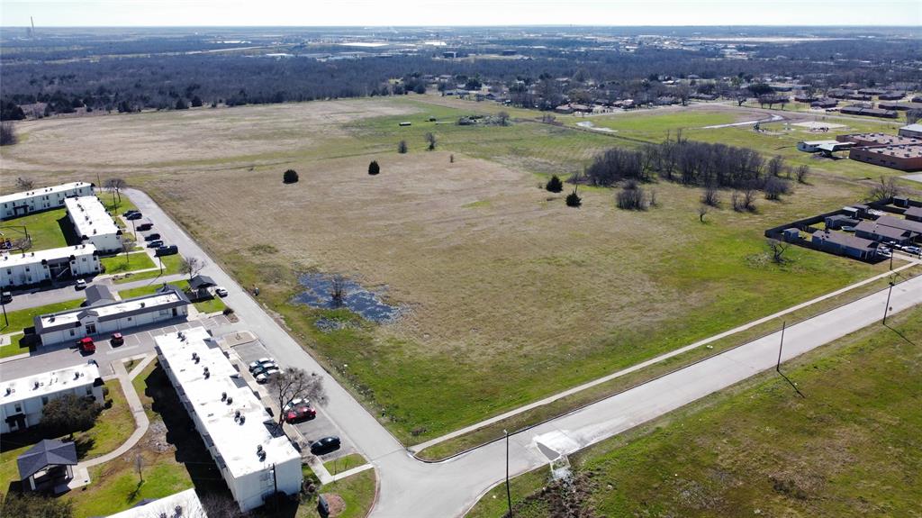 Birds eye view of property featuring a rural view