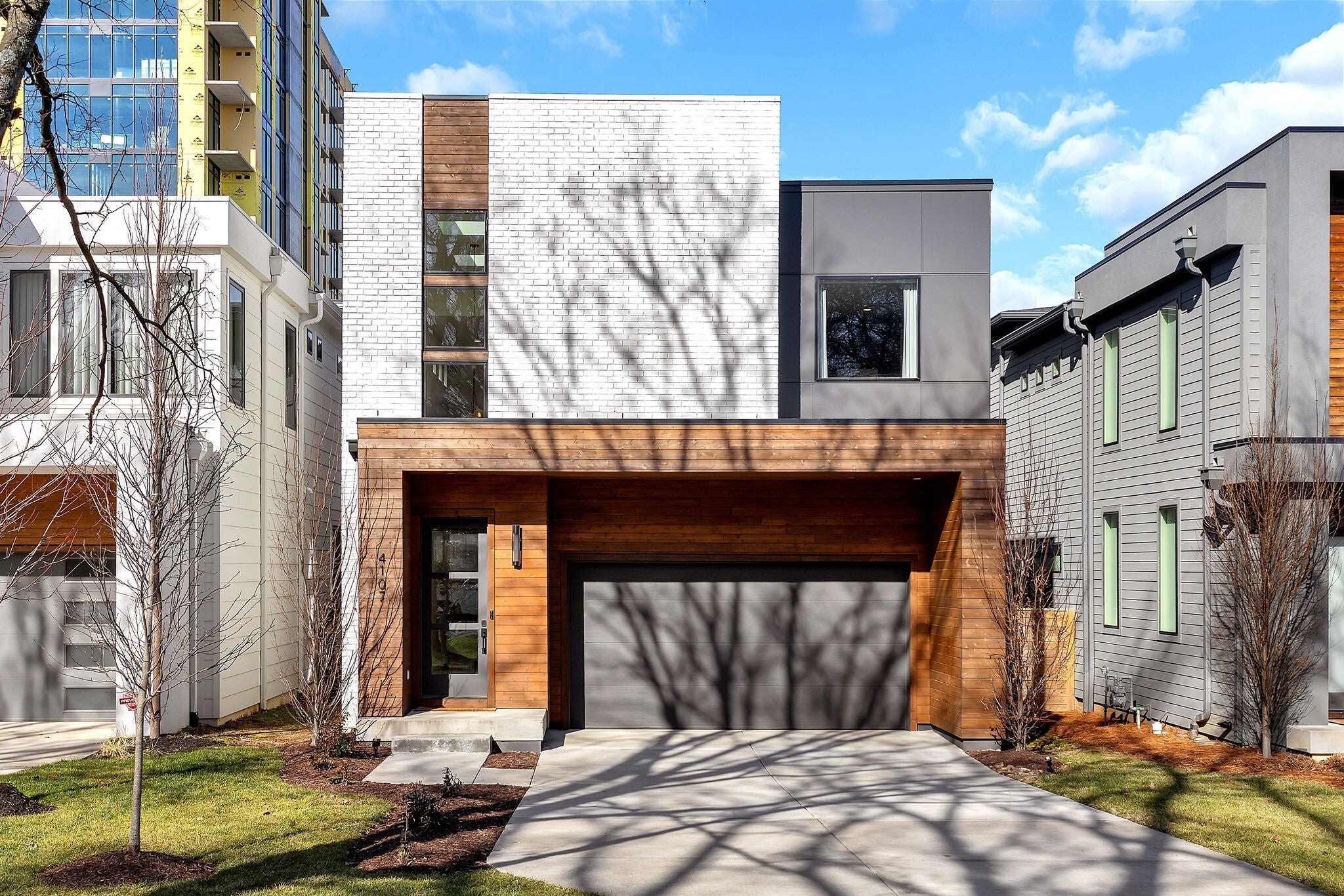 a front view of a house with parking