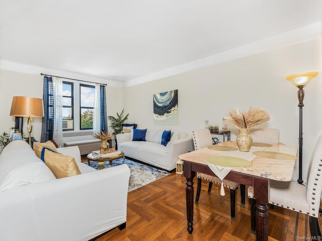 a living room with furniture and a table