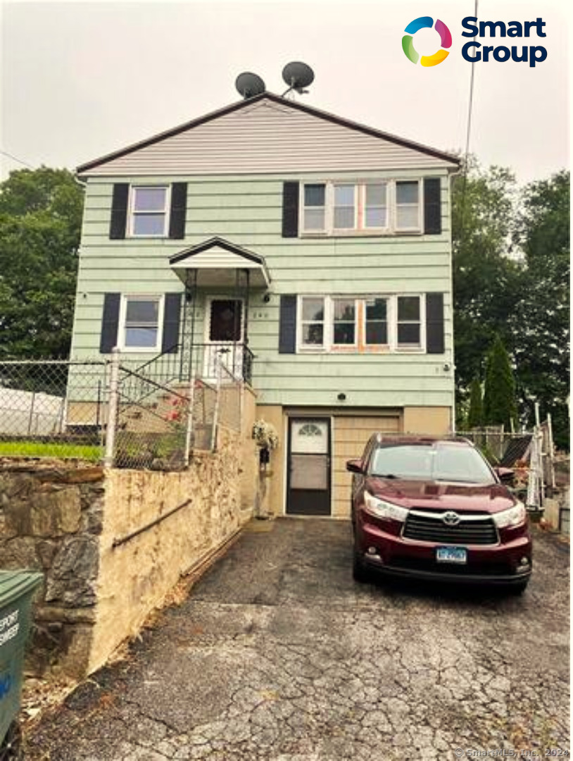 a car parked in front of a house