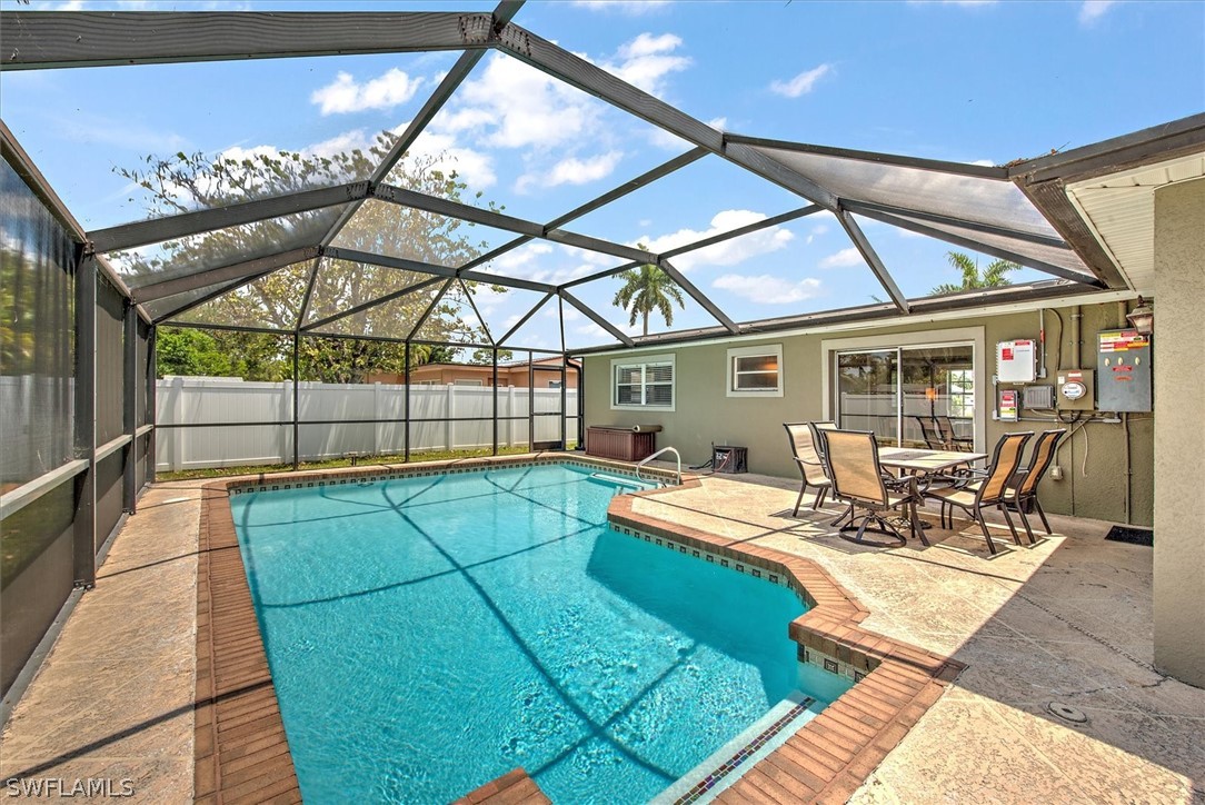 a view of a swimming pool with a patio