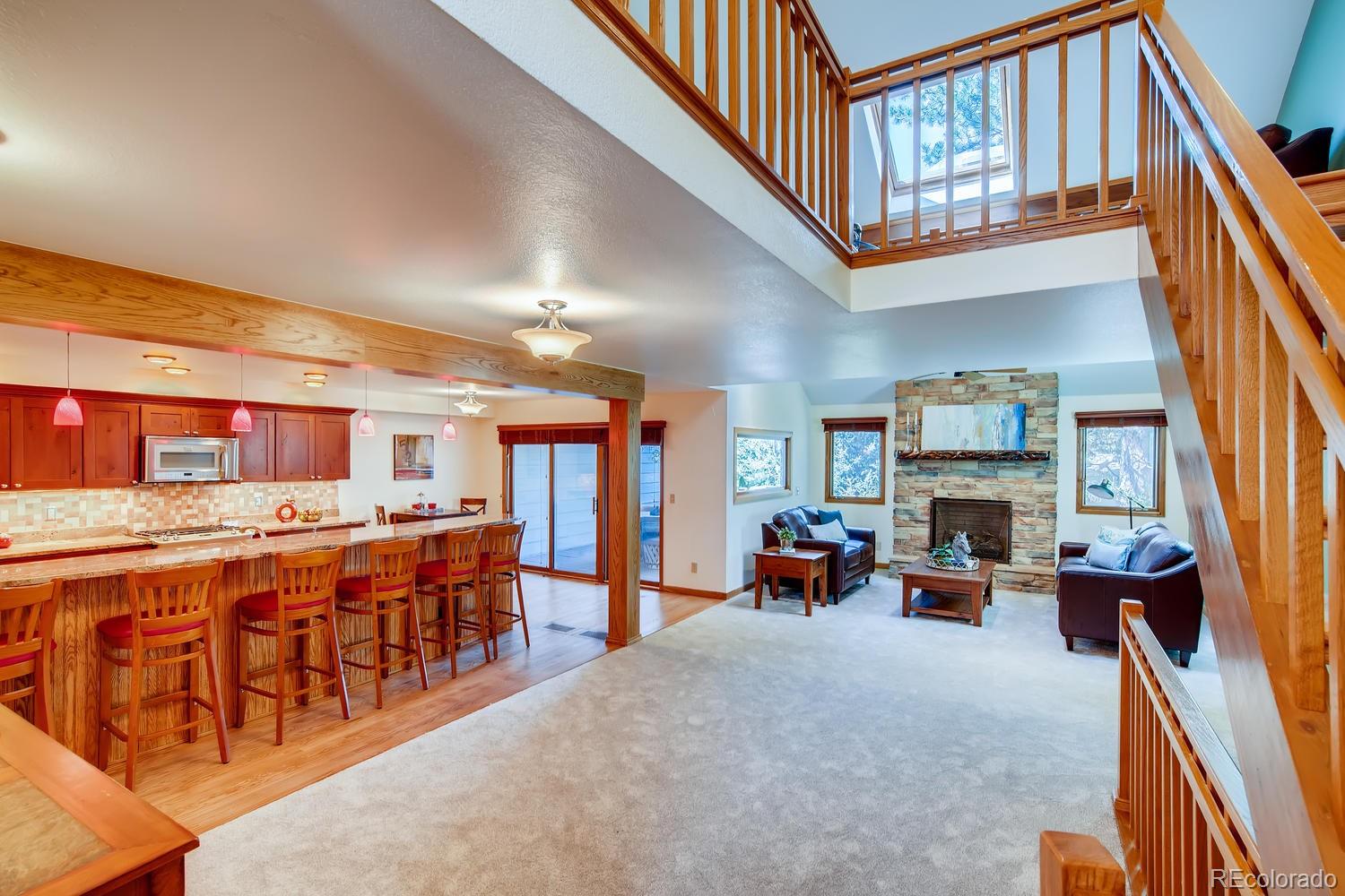 a very nice looking living room with a large window