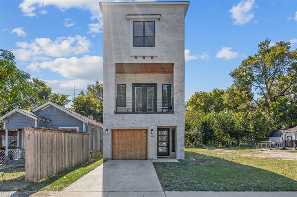 a front view of a house with yard