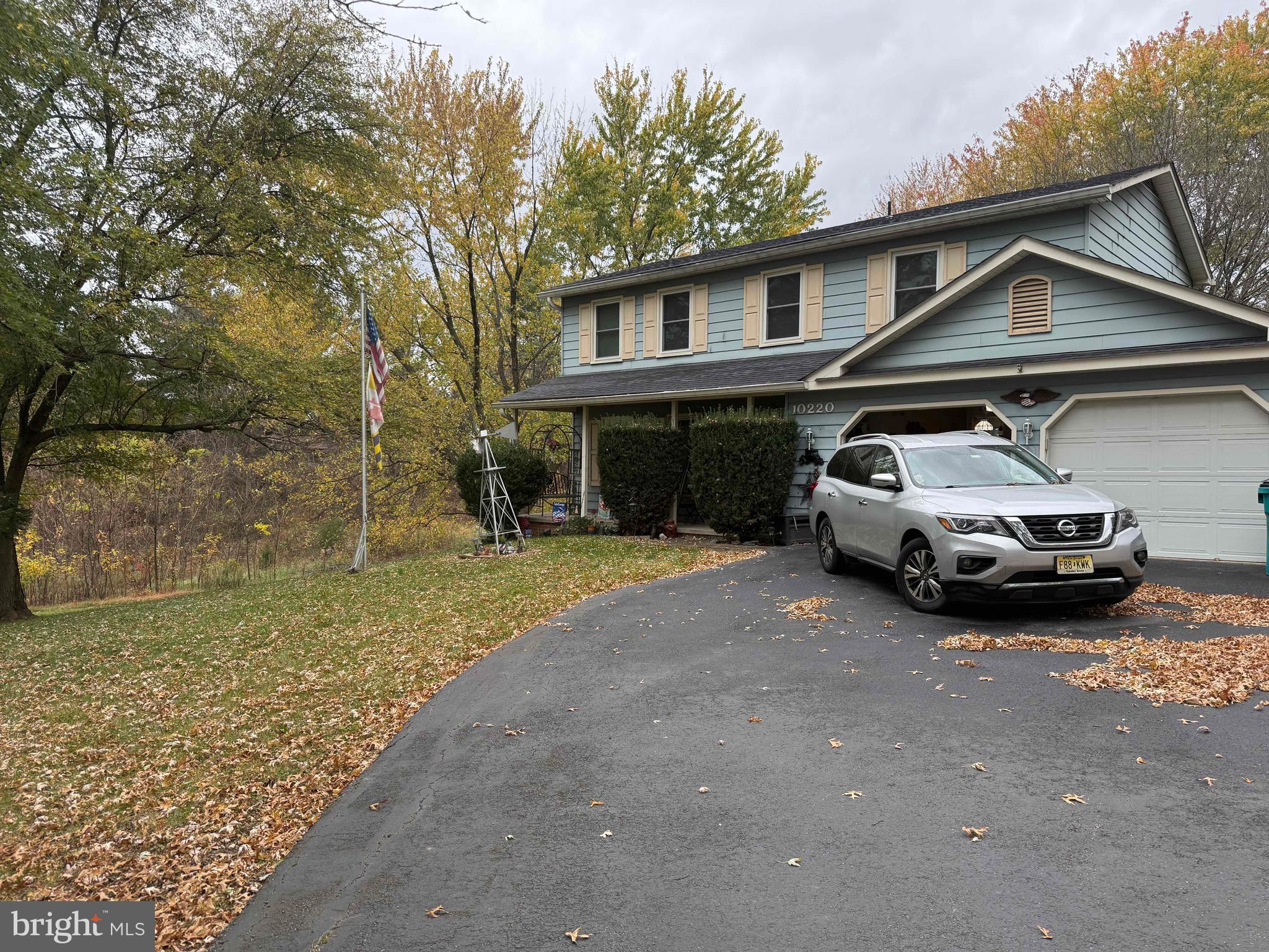 a car parked in front of a house