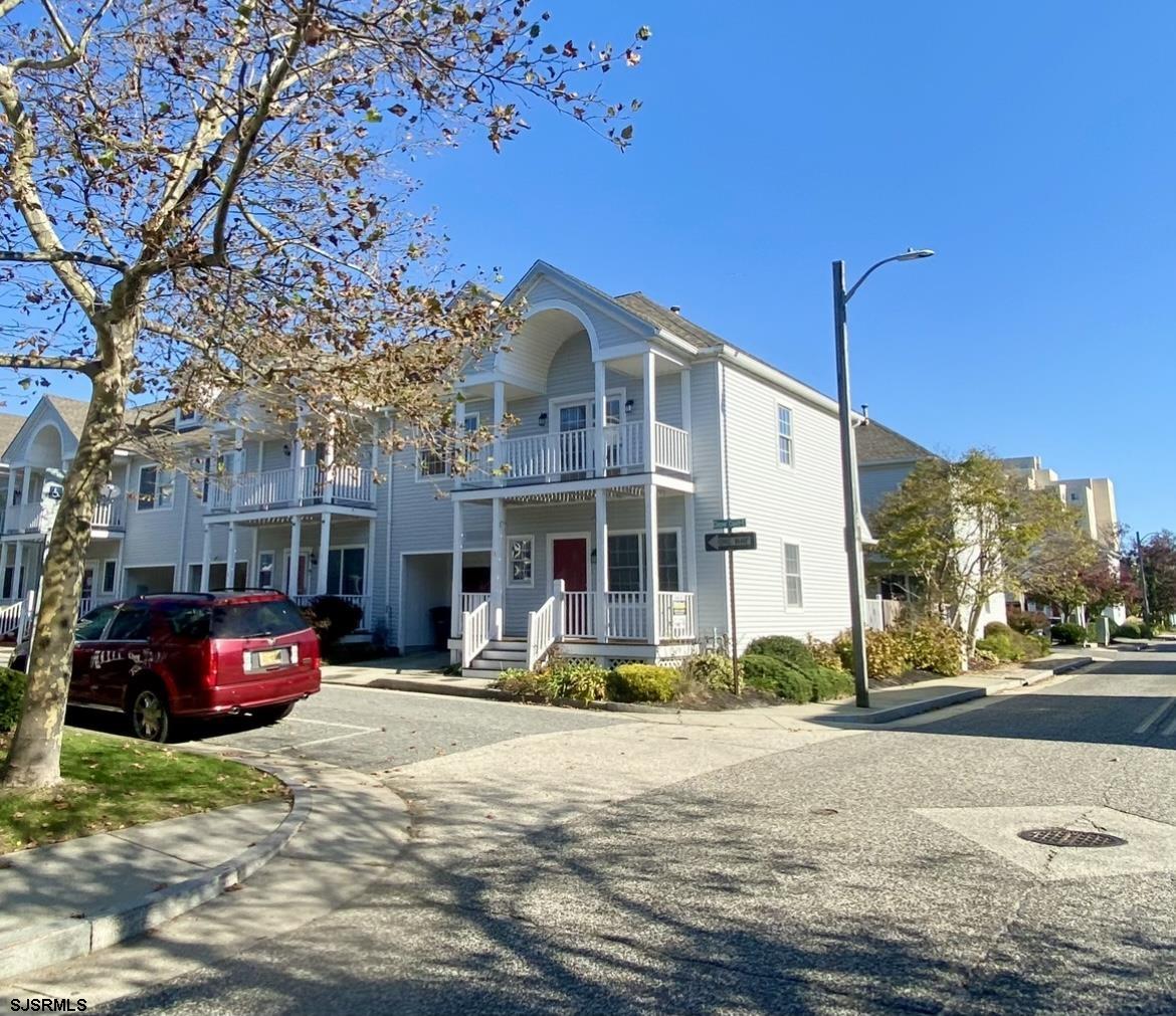 a front view of a building with street view