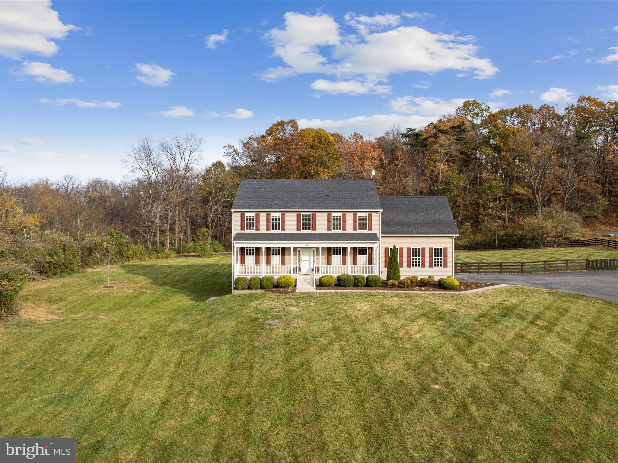 a view of a house with a big yard