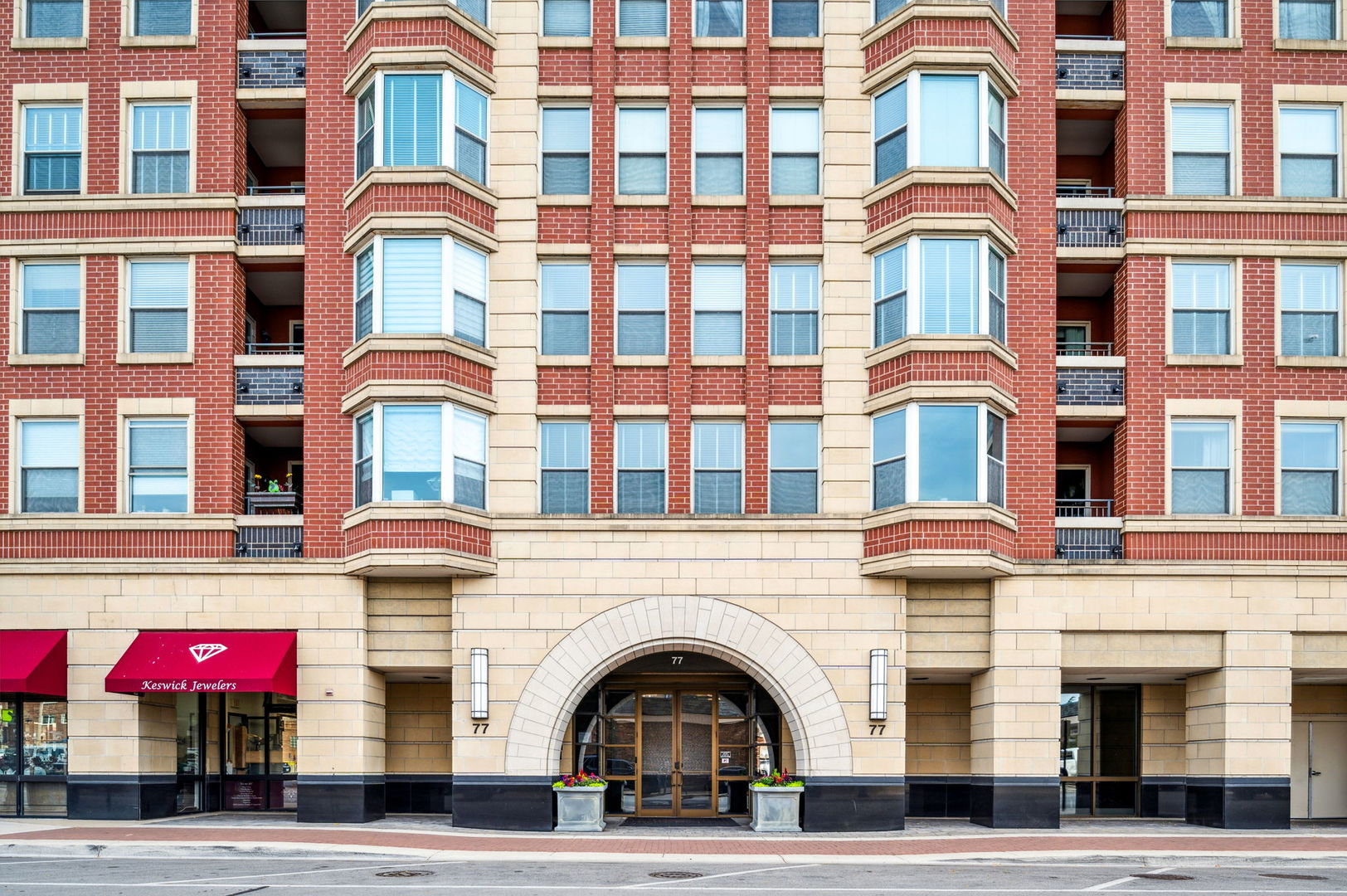 a front view of a multi story residential apartment building