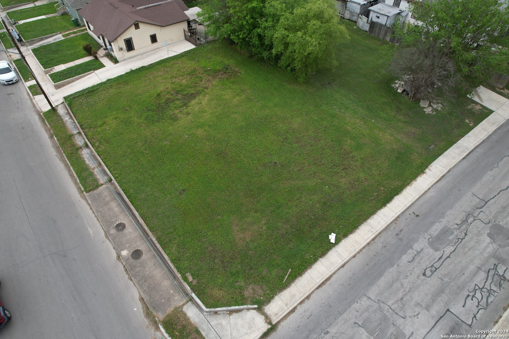 a view of a backyard with a garden