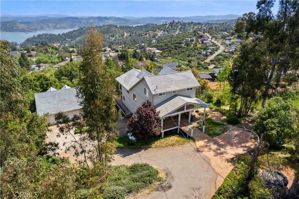 an aerial view of a house with a garden