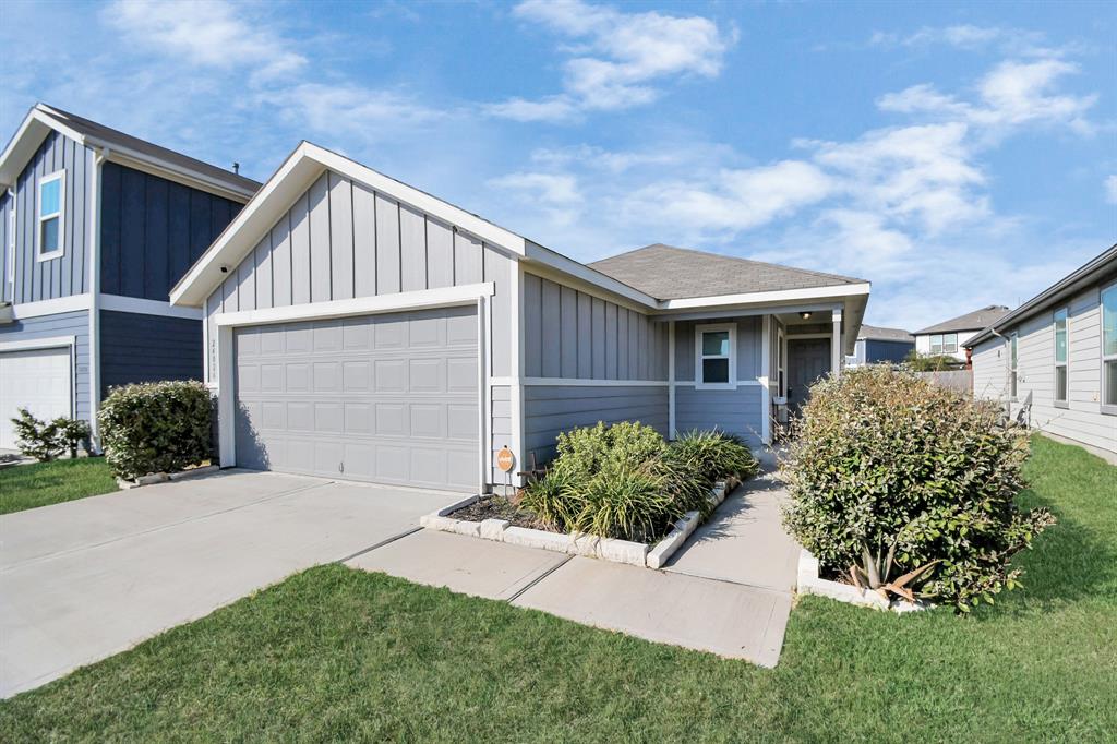 front view of house with a yard