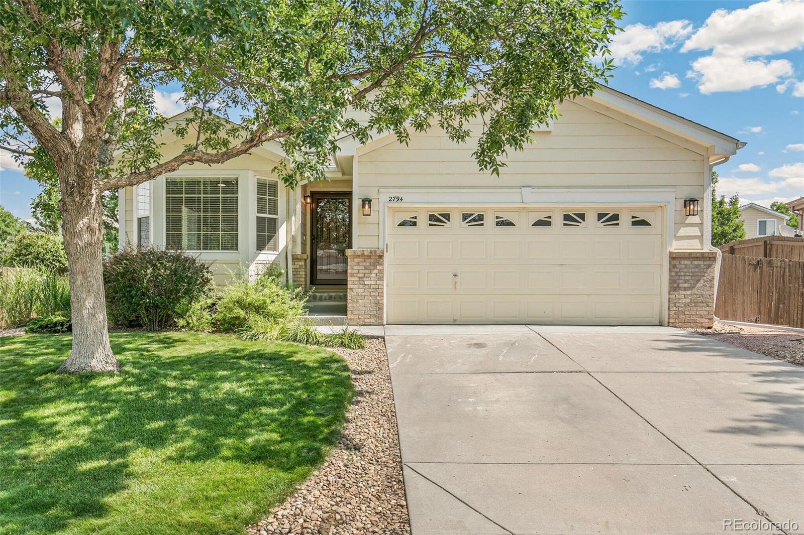 a view of front of house with garage